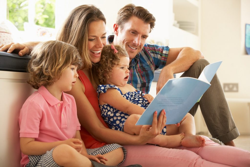 Parents reading a story with their kids
