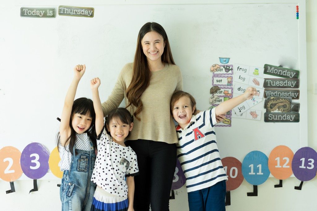 a teacher with her students