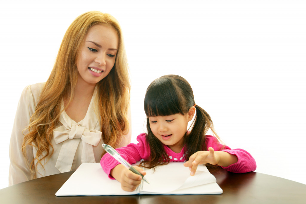 teacher tutoring child